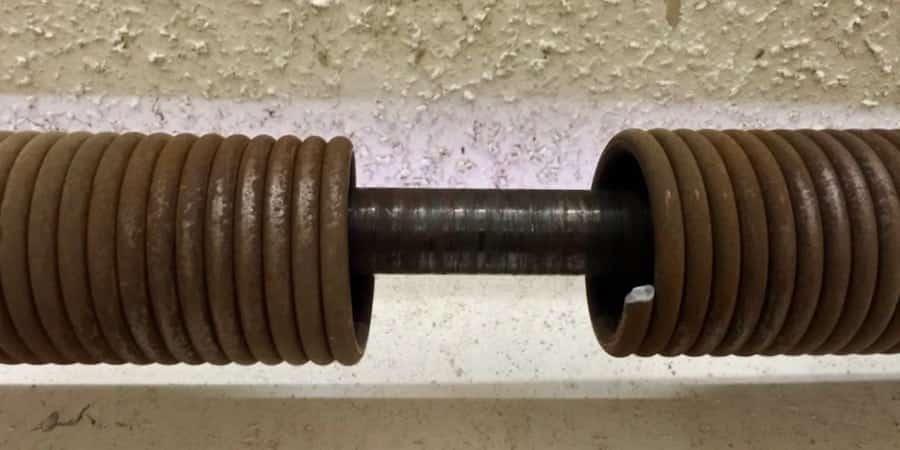 can i open a garage-door with a broken spring